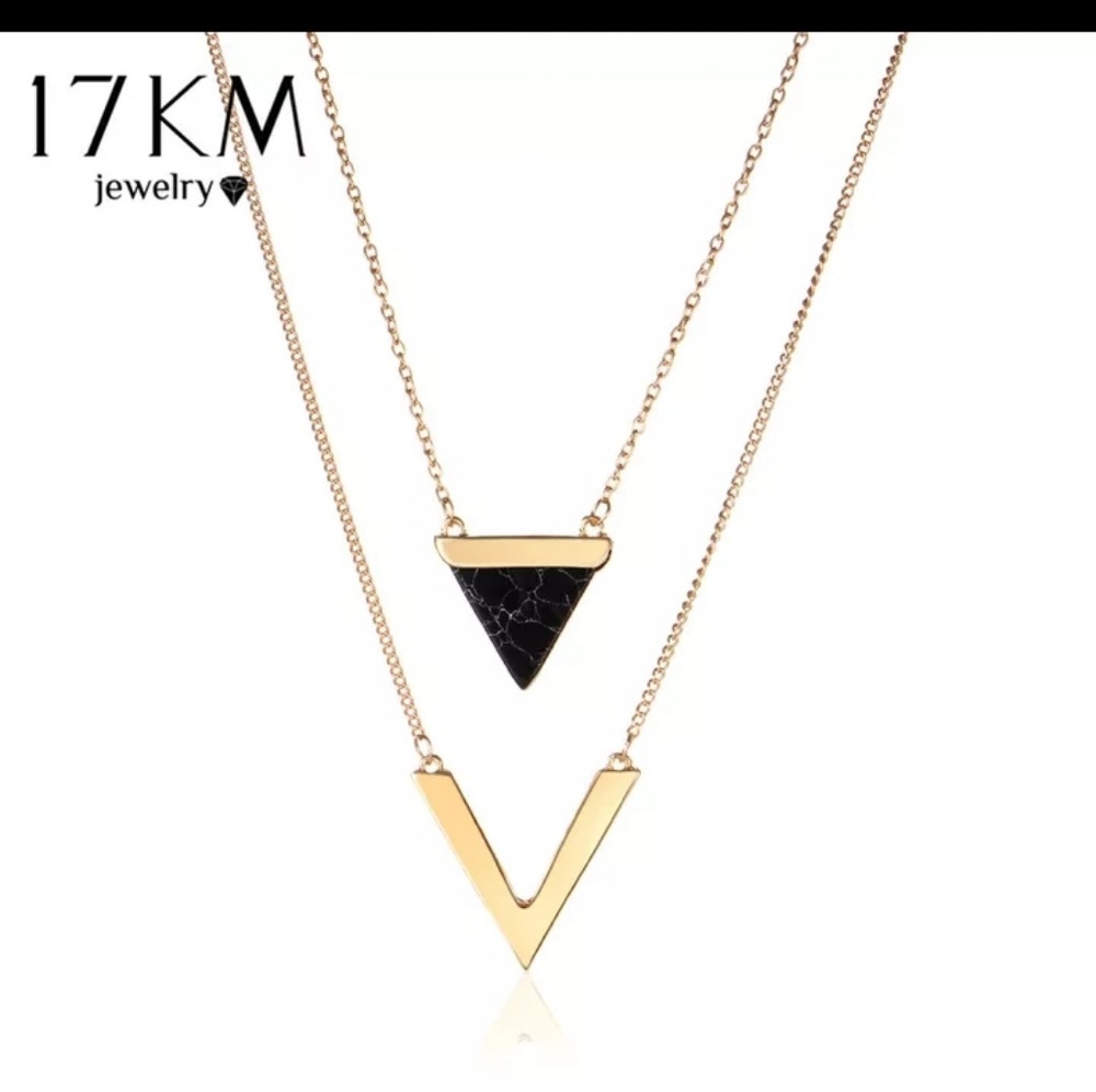 Golden necklace with V